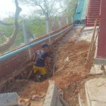 Arbeiter bei Bauarbeiten am Fundament der Halle LOLHS